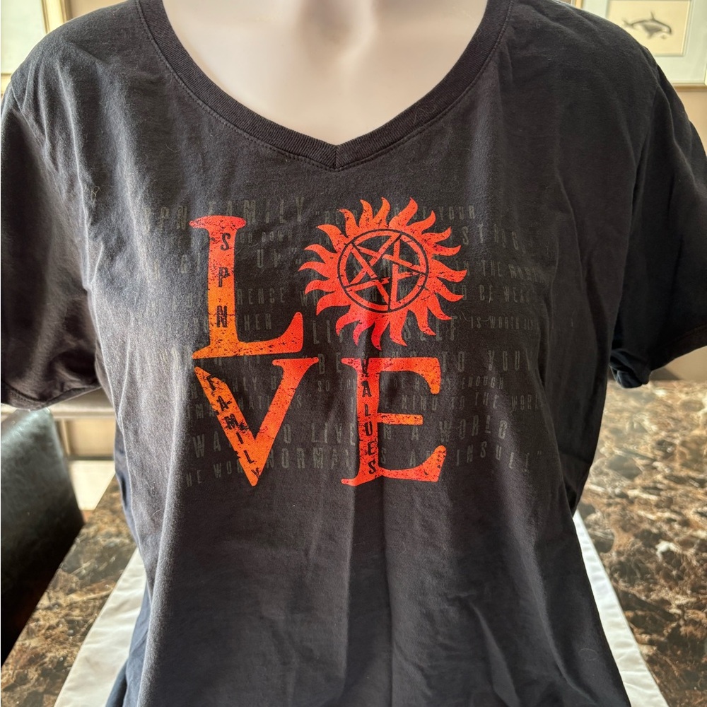 Supernatural Charity Black T-Shirt with Red and Orange Love Graphic